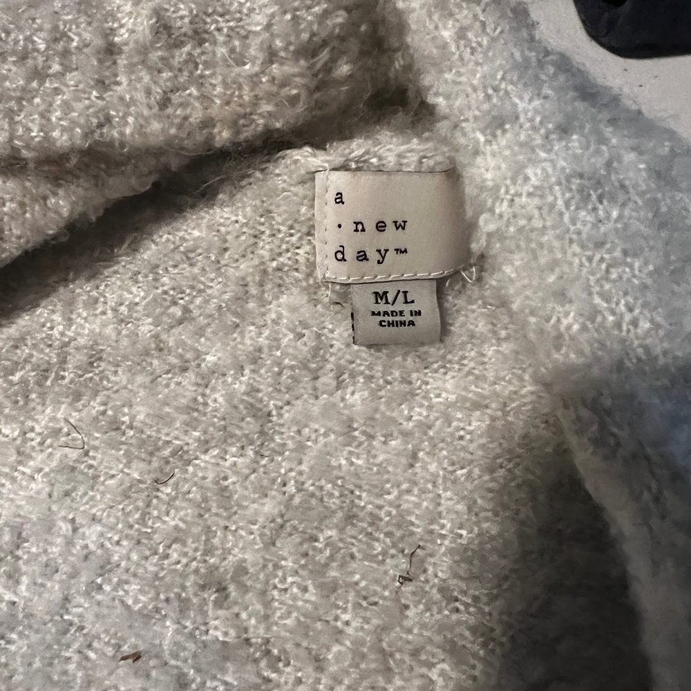 A new day sweater